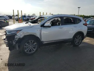 2021 Honda CR-V Touring z VIN 7FART6H92ME002266, wystawiony jako Copart lot #56885905 z przebiegiem Nie podano mil oraz Szkoda całkowita • Salvage title. Historia ofert i sprzedaży dostępna na DreamBid. Obrazek 1.