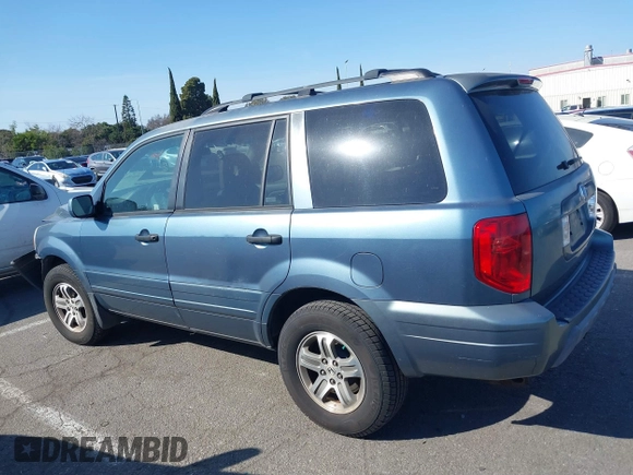 2005 Honda Pilot EX-L with VIN 2HKYF18565H534394, listed as a IAAI auction lot 41539630 with 168,384 mi miles. Bid and sale history available at carsss.com. Image 14.