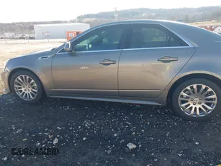 2011 Cadillac CTS Performance with VIN 1G6DK5ED6B0156490, listed as a IAAI auction lot 41346869 with 145,627 mi miles and . Bid and sale history available at DreamBid. Image 14.