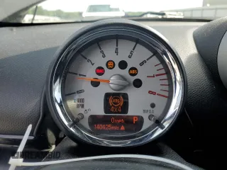 2012 MINI Countryman S with VIN WMWZC5C5XCWL56232, listed as a Copart auction lot 60298705 with 140,425 mi miles and Salvage title. Bid and sale history available at DreamBid. Image 9.