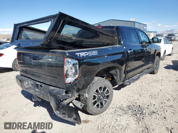 2021 Toyota Tundra Platinum with VIN 5TFAY5F16MX021555, listed as a Copart auction lot 46720185 with 136,112 mi miles and Salvage title. Bid and sale history available at DreamBid. Image 3.