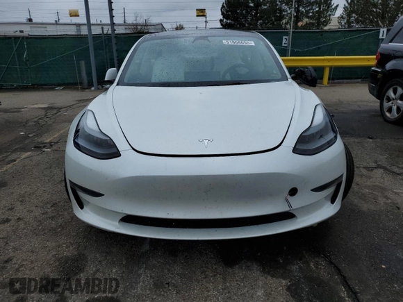 2023 Tesla Model 3 with VIN 5YJ3E1EAXPF600008, listed as a Copart auction lot 51868055 with 58,733 mi miles and Salvage title. Bid and sale history available at DreamBid. Image 5.