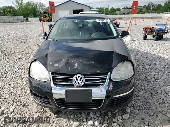 2009 Volkswagen Jetta SE с VIN 3VWRZ71K09M152289, выставлен на аукционе Copart как лот 56928795 с пробегом 103 347 миль миль и Списание • Salvage title. История ставок и продаж доступна на DreamBid. Изображение 13.