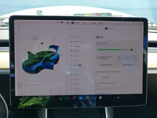 2019 Tesla Model 3 Mid Range with VIN 5YJ3E1EA1KF422983, listed as a IAAI auction lot 41861334 with 53,017 mi miles. Bid and sale history available at carsss.com. Image 17.