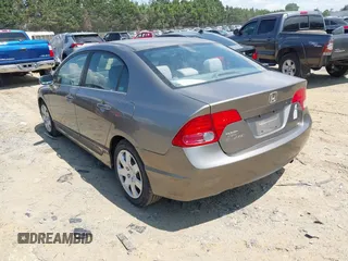 2006 Honda Civic LX with VIN 1HGFA16596L116774, listed as a IAAI auction lot 42674620 with 258,067 mi miles and . Bid and sale history available at DreamBid. Image 3.