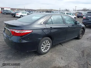 2015 Toyota Camry Hybrid LE with VIN 4T1BD1FK3FU164092, listed as a IAAI auction lot 41886726 with 396,189 mi miles. Bid and sale history available at carsss.com. Image 4.