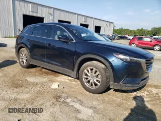 2017 Mazda CX-9 Touring with VIN JM3TCACY7H0140268, listed as a Copart auction lot 60982885 with 157,656 mi miles and Salvage title. Bid and sale history available at DreamBid. Image 4.