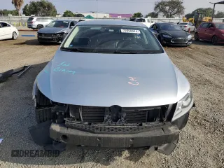 2015 Volkswagen CC R-Line with VIN WVWBN7AN4FE805069, listed as a Copart auction lot 72656024 with 61,898 mi miles and Salvage Title. Bid and sale history available at DreamBid. Image 5.