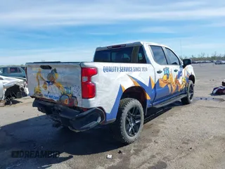 2023 Chevrolet Silverado 1500 LT Trail Boss with VIN 3GCUDFED3PG197885, listed as a IAAI auction lot 41733427 with 64,911 mi miles and . Bid and sale history available at DreamBid. Image 4.