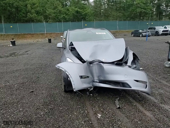2025 Tesla Model Y Performance with VIN 7SAYGDEF2SF232223, listed as a Copart auction lot 50419235 with 0 mi miles and Salvage Title. Bid and sale history available at carsss.com. Image 11.
