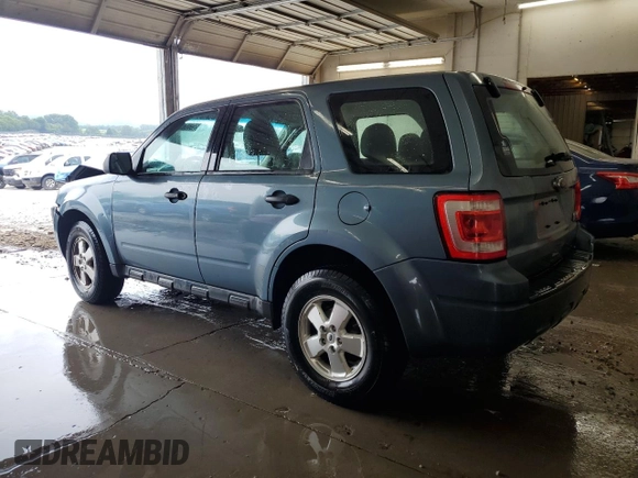 2012 Ford Escape XLS with VIN 1FMCU0C71CKA64501, listed as a Copart auction lot 59606245 with 112,112 mi miles and Salvage title. Bid and sale history available at DreamBid. Image 2.