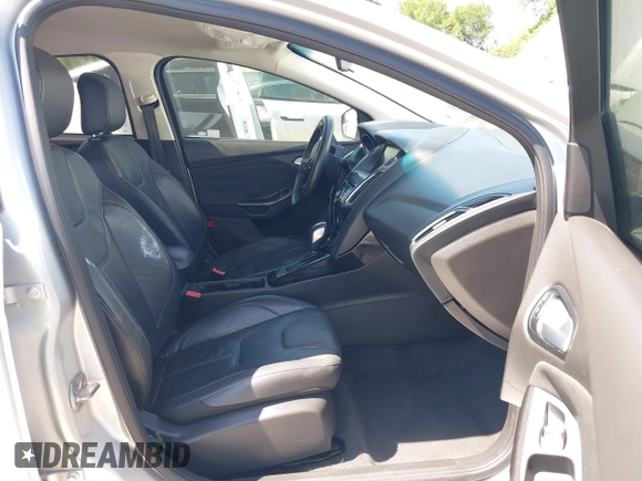 2015 Ford Focus Titanium with VIN 1FADP3N23FL356822, listed as a IAAI auction lot 41981053 with 115,584 mi miles and . Bid and sale history available at DreamBid. Image 5.