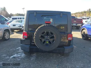 2015 Jeep Wrangler Unlimited Sport with VIN 1C4BJWDG5FL766989, listed as a IAAI auction lot 41342159 with 182,483 mi miles. Bid and sale history available at carsss.com. Image 16.