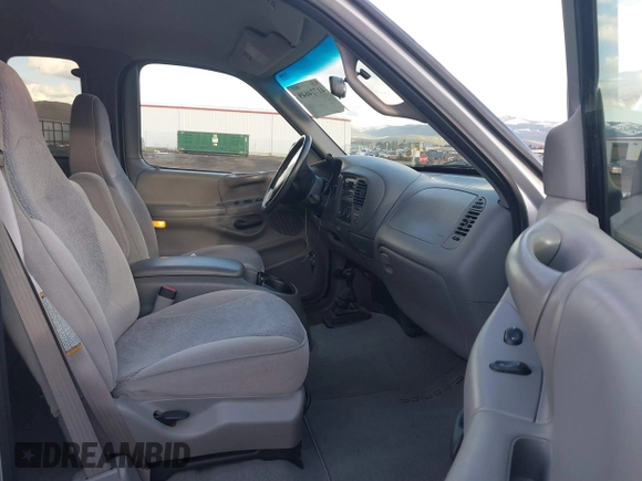 1998 Ford F-150 with VIN 2FTZX18W5WCA42375, listed as a IAAI auction lot 41724649 with 71,034 mi miles and . Bid and sale history available at DreamBid. Image 5.