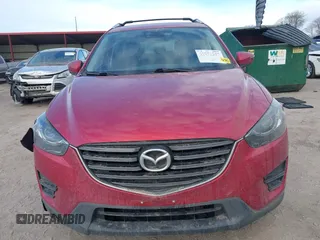 2016 Mazda CX-5 Grand Touring with VIN JM3KE4DY8G0729446, listed as a IAAI auction lot 41871207 with 89,258 mi miles. Bid and sale history available at carsss.com. Image 13.