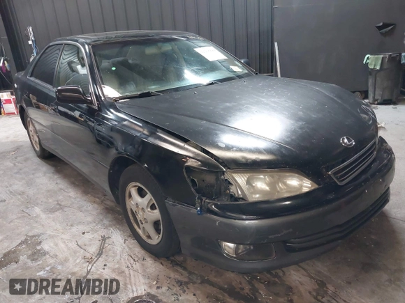 2001 Lexus ES 300 z VIN JT8BF28G415112517, wystawiony jako IAAI lot #42208849 z przebiegiem 202 029 mil mil oraz . Historia ofert i sprzedaży dostępna na DreamBid. Obrazek 1.