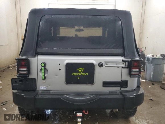 2013 Jeep Wrangler Sport with VIN 1C4AJWAG5DL591897, listed as a Copart auction lot 63218025 with 81,250 mi miles and Clean title. Bid and sale history available at DreamBid. Image 6.
