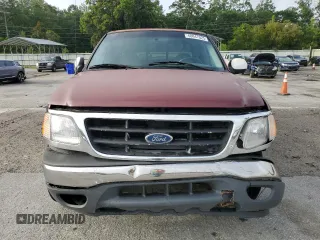 1999 Ford F-150 XL with VIN 1FTRX17LXXNA05552, listed as a Copart auction lot 60047025 with 193,122 mi miles and Salvage title. Bid and sale history available at DreamBid. Image 5.