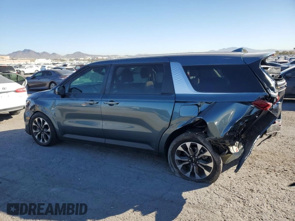 2022 Kia Carnival EX with VIN KNDNC5H32N6072329, listed as a Copart auction lot 77472514 with 25,909 mi miles and Salvage Title. Bid and sale history available at carsss.com. Image 2.