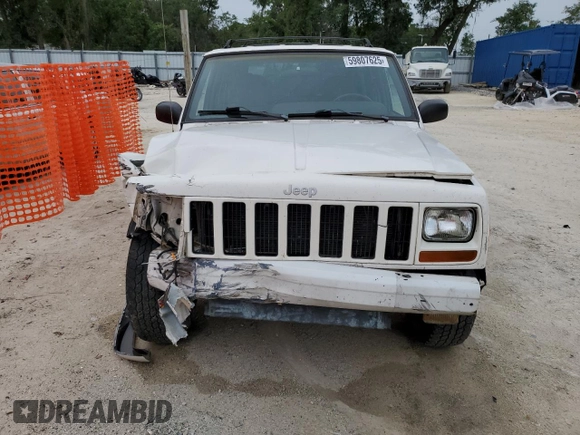 2001 Jeep Cherokee Sport with VIN 1J4FF48S31L520760, listed as a Copart auction lot 59807625 with 298,489 mi miles and Salvage title. Bid and sale history available at DreamBid. Image 5.
