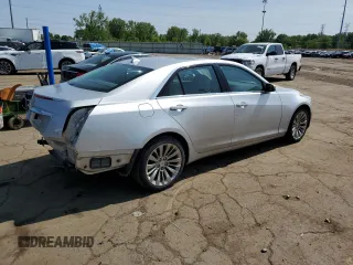 2014 Cadillac CTS Luxury AWD z VIN 1G6AX5S30E0155761, wystawiony jako Copart lot #59227295 z przebiegiem 139 813 mil mil oraz Tytuł czysty. Historia ofert i sprzedaży dostępna na DreamBid. Obrazek 3.