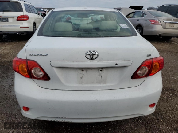 2010 Toyota Corolla z VIN JTDBU4EE3AJ069480, wystawiony jako Copart lot #86174274 z przebiegiem 213 559 mil mil oraz Szkoda całkowita • Salvage title. Historia ofert i sprzedaży dostępna na DreamBid. Obrazek 6.
