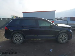 2020 Volkswagen Tiguan S with VIN 3VV1B7AX8LM105021, listed as a IAAI auction lot 41677856 with 50,885 mi miles. Bid and sale history available at carsss.com. Image 13.