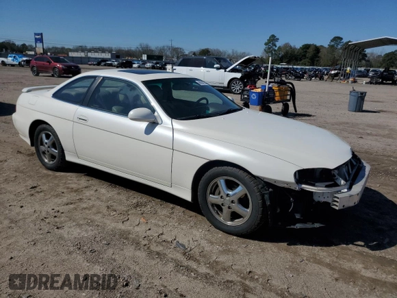 1998 Lexus SC 300 z VIN JT8CD32Z5W1004027, wystawiony jako Copart lot #48164775 z przebiegiem 132 030 mil mil oraz Szkody całkowita. Historia ofert i sprzedaży dostępna na DreamBid. Obrazek 4.