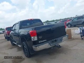 2013 Toyota Tundra Limited with VIN 5TFFY5F19DX142652, listed as a IAAI auction lot 42165369 with 152,286 mi miles and . Bid and sale history available at DreamBid. Image 3.