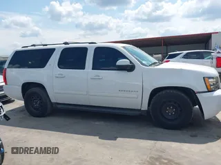 2013 Chevrolet Suburban LT with VIN 1GNSCJE08DR102735, listed as a IAAI auction lot 42228063 with 101,671 mi miles and . Bid and sale history available at DreamBid. Image 14.
