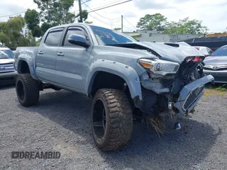 2019 Toyota Tacoma SR z VIN 5TFCZ5AN2KX204125, wystawiony jako IAAI lot #41764966 z przebiegiem Nie podano mil oraz . Historia ofert i sprzedaży dostępna na DreamBid. Obrazek 1.