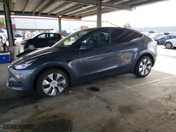 2023 Tesla Model Y Long Range with VIN 7SAYGDEEXPA137582, listed as a Copart auction lot 46869265 with 16,474 mi miles and Salvage Title. Bid and sale history available at carsss.com. Image 1.