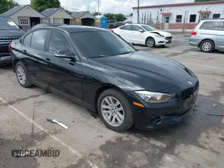2014 BMW 3 Series 320i with VIN WBA3B1G52ENS80039, listed as a IAAI auction lot 42253717 with 104,388 mi miles and . Bid and sale history available at DreamBid. Image 1.