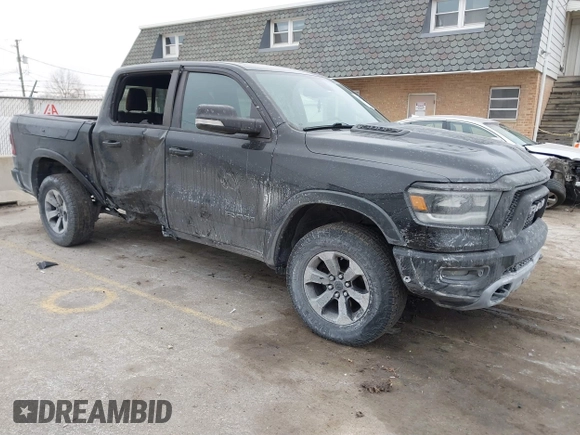 2019 Ram 1500 Rebel z VIN 1C6SRFLT6KN599362, wystawiony jako IAAI lot #41560018 z przebiegiem Nie podano mil oraz . Historia ofert i sprzedaży dostępna na DreamBid. Obrazek 1.