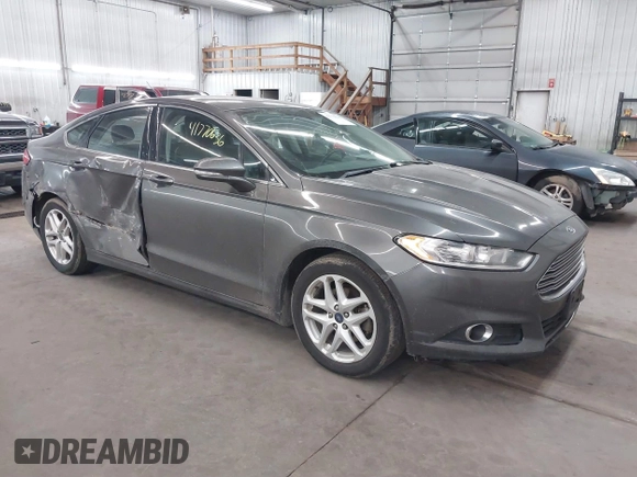 2015 Ford Fusion SE z VIN 3FA6P0HD0FR132316, wystawiony jako IAAI lot #41770636 z przebiegiem 185 681 mil mil oraz . Historia ofert i sprzedaży dostępna na DreamBid. Obrazek 1.