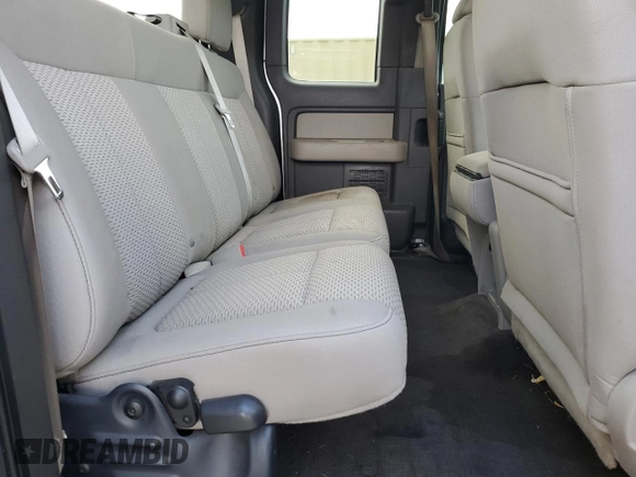 2010 Ford F-150 XL with VIN 1FTFX1EV6AFC58473, listed as a Copart auction lot 52357365 with 122,755 mi miles and Salvage title. Bid and sale history available at DreamBid. Image 11.