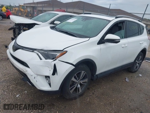 2018 Toyota RAV4 XLE with VIN 2T3WFREV4JW469929, listed as a IAAI auction lot 42536958 with 82,443 mi miles and . Bid and sale history available at DreamBid. Image 17.