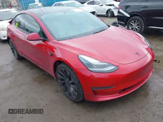 2021 Tesla Model 3 Performance with VIN 5YJ3E1EC5MF050598, listed as a IAAI auction lot 41778169 with 74,710 mi miles and . Bid and sale history available at carsss.com. Image 1.