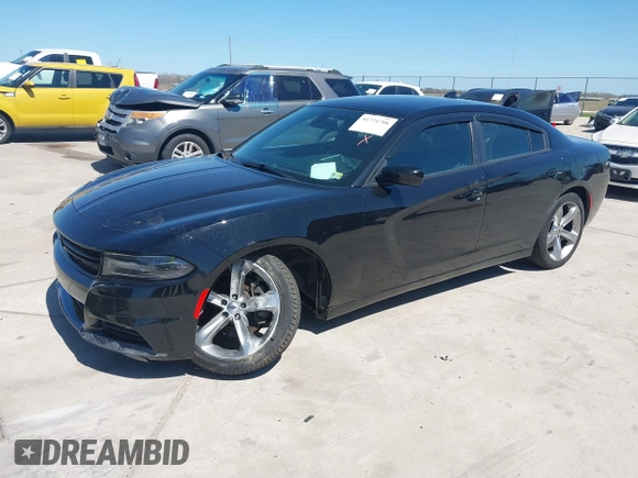 2018 Dodge Charger R/T with VIN 2C3CDXCT9JH128853, listed as a IAAI auction lot 41771706 with 54,962 mi miles and . Bid and sale history available at carsss.com. Image 17.