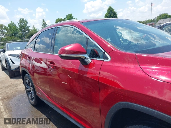 2016 Lexus RX 450h with VIN 2T2BGMCA1GC007583, listed as a IAAI auction lot 42590022 with 152,810 mi miles and . Bid and sale history available at DreamBid. Image 13.