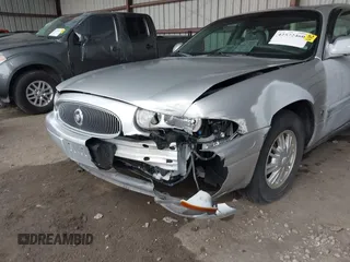 2003 Buick LeSabre Limited z VIN 1G4HR54K13U209094, wystawiony jako IAAI lot #42572460 z przebiegiem 102 970 mil mil oraz . Historia ofert i sprzedaży dostępna na DreamBid. Obrazek 6.