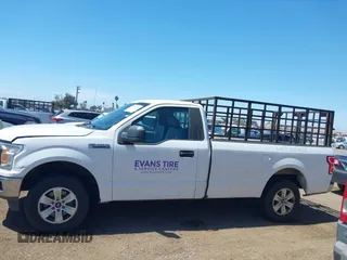 2018 Ford F-150 XL with VIN 1FTNF1CG9JKC41855, listed as a IAAI auction lot 41974456 with 330,339 mi miles and . Bid and sale history available at DreamBid. Image 14.