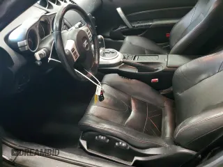 2008 Nissan 350Z z VIN JN1BZ34DX8M706512, wystawiony jako Copart lot #59040615 z przebiegiem 59 678 mil mil oraz Czysty tytuł • Clean title. Historia ofert i sprzedaży dostępna na DreamBid. Obrazek 7.