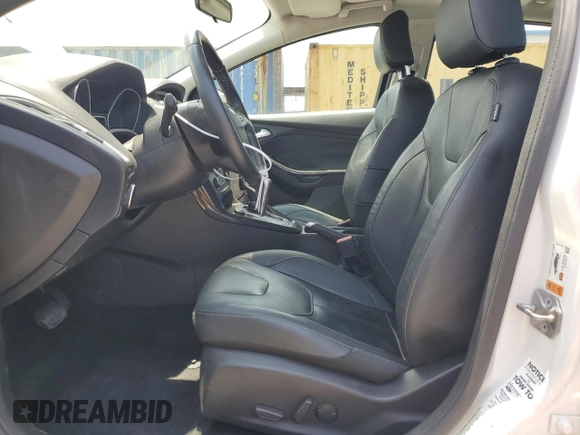 2015 Ford Focus Titanium с VIN 1FADP3J24FL304136, выставлен на аукционе Copart как лот 58428865 с пробегом 81 668 миль миль и Списание • Salvage title. История ставок и продаж доступна на DreamBid. Изображение 7.