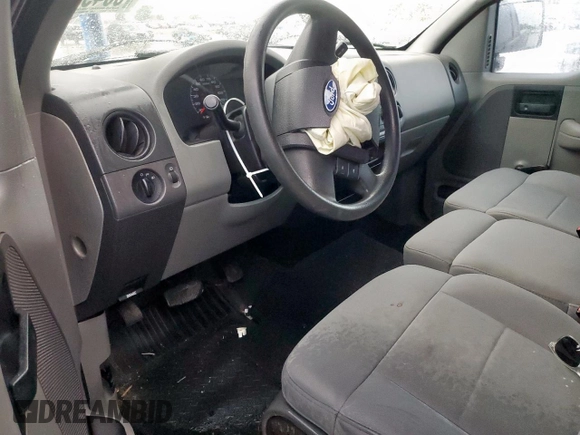 2007 Ford F-150 XL with VIN 1FTRF12217KC92122, listed as a Copart auction lot 60499615 with 110,510 mi miles and Salvage title. Bid and sale history available at DreamBid. Image 8.
