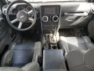 2010 Jeep Wrangler Unlimited Sahara with VIN 1J4HA5H13AL182071, listed as a Copart auction lot 51696665 with 178,026 mi miles and Salvage Title. Bid and sale history available at carsss.com. Image 8.