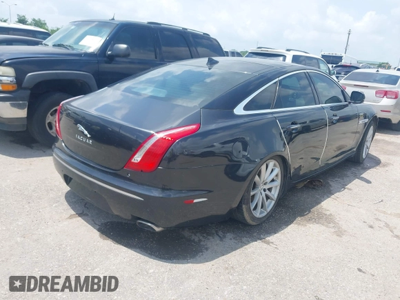 2013 Jaguar XJ with VIN SAJWA1C77D8V44610, listed as a IAAI auction lot 42150382 with Not Provided miles and . Bid and sale history available at DreamBid. Image 4.