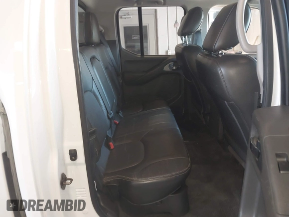 2014 Nissan Frontier SV with VIN 1N6AD0EV4EN736220, listed as a IAAI auction lot 41241823 with 91,789 mi miles and . Bid and sale history available at DreamBid. Image 8.