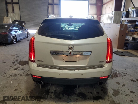 2015 Cadillac SRX Luxury Collection z VIN 3GYFNBE38FS618933, wystawiony jako Copart lot #45332835 z przebiegiem 64 819 mil mil oraz Szkody całkowita. Historia ofert i sprzedaży dostępna na DreamBid. Obrazek 6.