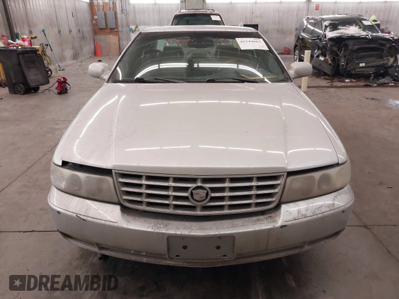 2003 Cadillac Seville Luxury SLS z VIN 1G6KS54Y93U200813, wystawiony jako IAAI lot #41544661 z przebiegiem 159 550 mil mil oraz . Historia ofert i sprzedaży dostępna na DreamBid. Obrazek 6.